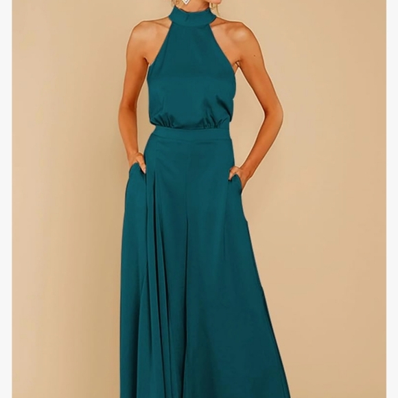 Pants - NWT. Stunning halter jumpsuit, sleeveless w/front pockets. Peacock Blue. Size M